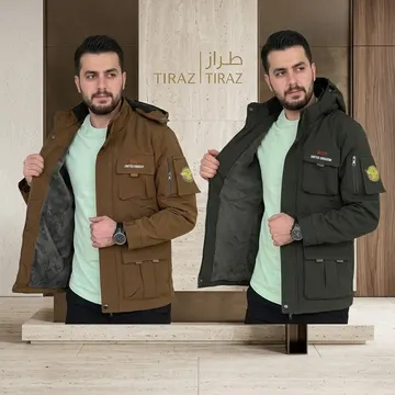 Two men modeling brown and olive parka jackets with fleece lining in a modern studio setting