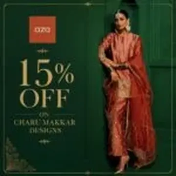 Woman in red traditional embroidered outfit standing against green wall with 15% off promotion text