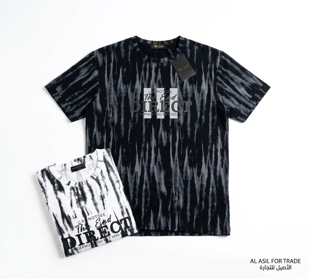 Two tie-dye t-shirts with bold text graphics displayed flat on a white background