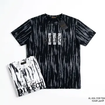 Two tie-dye t-shirts with bold text graphics displayed flat on a white background