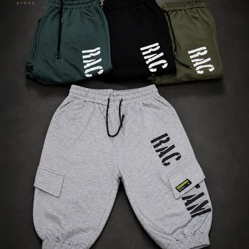 Four pairs of branded sweatpants in gray green black and olive with bold lettering