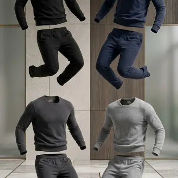 Four floating men's sweatsuits in black navy gray and light gray against marble and wood background