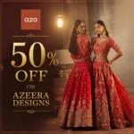 Two women wearing red embroidered lehengas in a promotional advertisement for 50% off