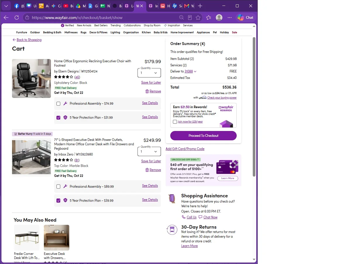 Wayfair cart showing black ergonomic chair and L-shaped desk with power outlets