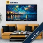 Vibrant starry night lake painting above mustard yellow sofa with black cushions